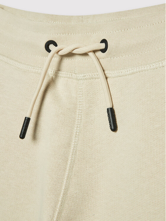 Guess Guess Spodnji del trenirke L2YQ46 KAIJ1 Bež Regular Fit