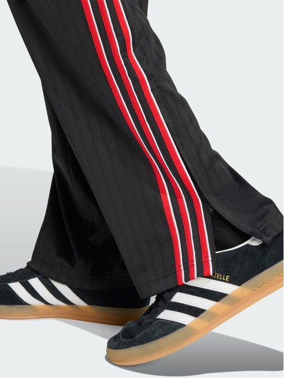 adidas adidas Spodnie dresowe Firebird loose pinstripes Czarny Loose Fit