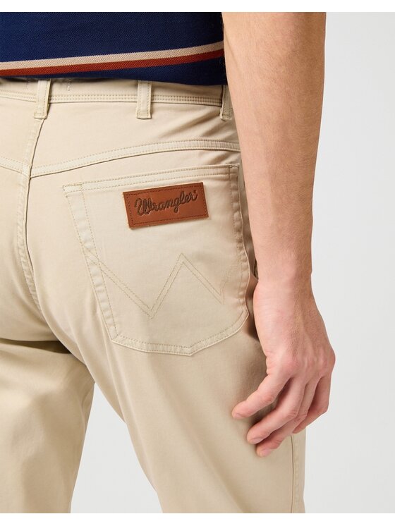 Wrangler Wrangler Spodnie materiałowe TEXAS SLIM Beżowy Slim Fit
