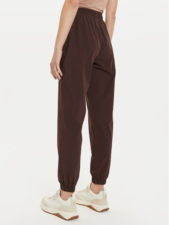Athlecia Athlecia Spodnji del trenirke Hero W Track EA233336 Rjava Regular Fit