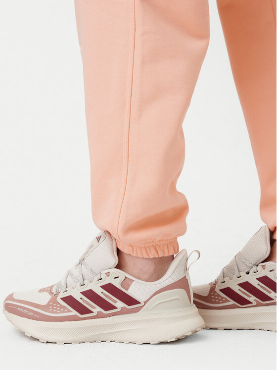 adidas adidas Spodnie dresowe Essentials JD1525 Różowy Loose Fit