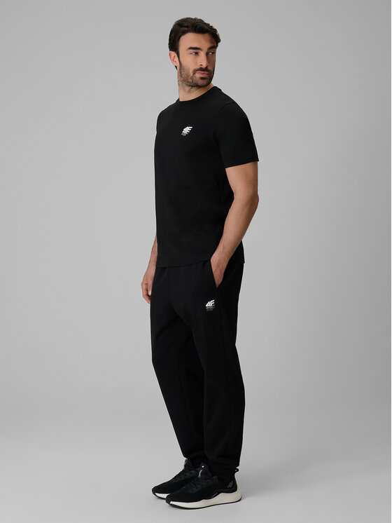 4F 4F Spodnie dresowe COMMERCIAL Czarny Loose Fit