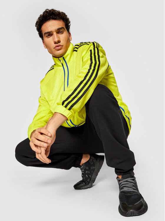 adidas adidas Geacă Reverse Track GN3818 Galben Regular Fit