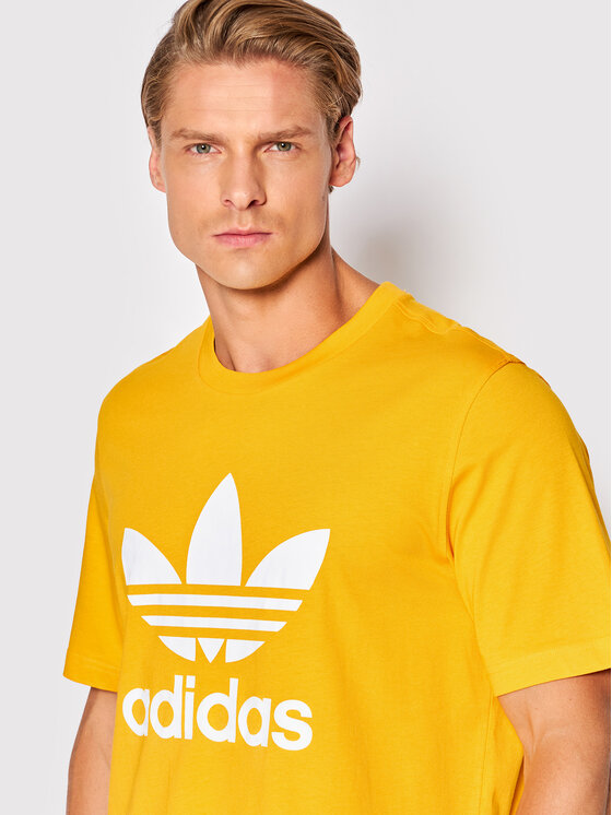 adidas T-Shirt adicolor Classic Trefoil HK5229 Żółty Regular Fit | Modivo.pl