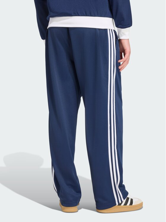 adidas adidas Spodnie dresowe ADICOLOR LOOSE Niebieski jasny Loose Fit