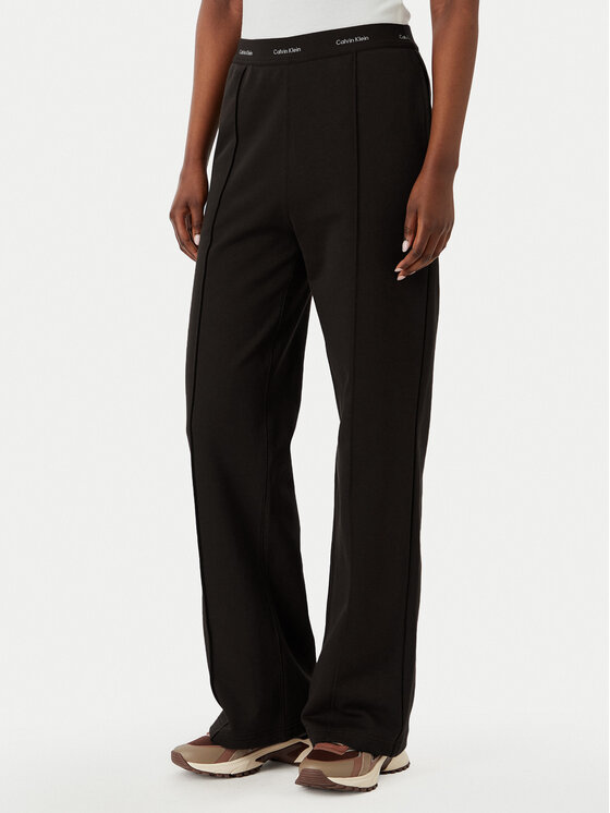 Calvin Klein Jeans Donji dio trenerke LV047G253G Tamno smeđa Relaxed Fit