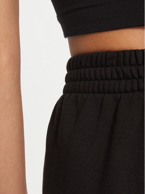 adidas adidas Pantaloni trening Essentials Fleece IY9637 Negru Loose Fit
