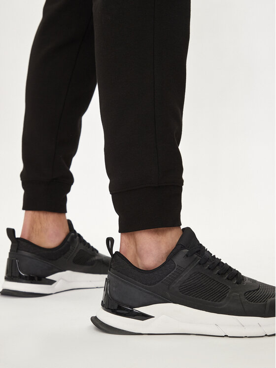 Calvin Klein Calvin Klein Donji dio trenerke Shadow Embosed Logo K10K113097 Crna Regular Fit