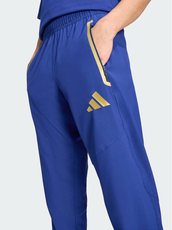 adidas adidas Spodnie materiałowe Włochy Tiro Błękitny Regular Fit
