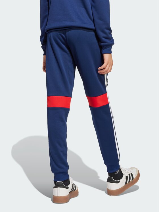 adidas adidas Spodnie materiałowe Tiro Niebieski jasny Regular Fit