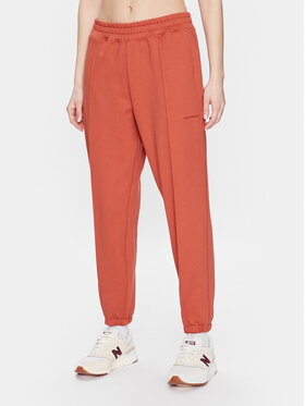 New Balance New Balance Spodnie dresowe Athletics Nature WP23553 Pomarańczowy Relaxed Fit