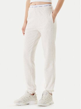 Guess Guess Spodnie dresowe O5RB01 KCO31 Beżowy Regular Fit