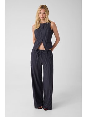 Guess Guess Spodnie materiałowe 183483 Niebieski Slim Fit