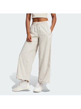 adidas adidas Pantaloni da tuta Essentials 3-Stripes JC8168 Beige Loose Fit