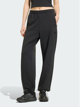 adidas adidas Spodnie dresowe KIT SMALL LOGO LOOSE CUFFED Czarny Loose Fit