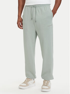 Tommy Hilfiger Tommy Hilfiger Spodnji del trenirke Essential UM0UM03911 Svetlo zelena Relaxed Fit