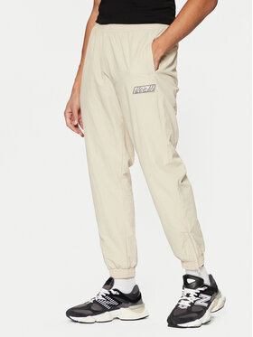 Karl Kani Karl Kani Pantaloni trening Sport Patch Essential 60030075 Bej Relaxed Fit