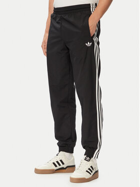 adidas adidas Sporta bikses Firebird Woven KE1371 Melns Regular Fit