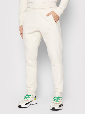 adidas adidas Spodnie dresowe adicolor Essentials HE9410 Beżowy Slim Fit