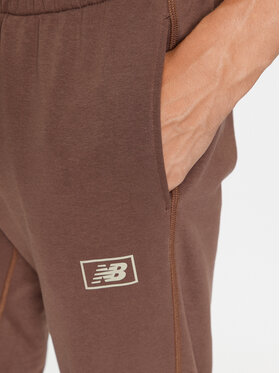 New Balance Spodnji Del Trenirke NB Essentials Sweatpant MP33509 Rjava Regular Fit