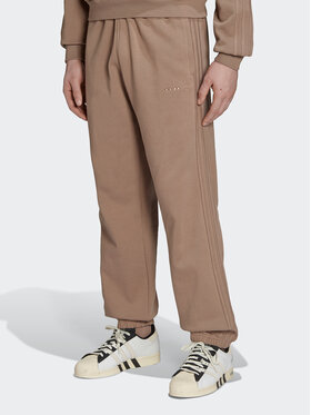 adidas adidas Spodnie dresowe Reveal Essentials HK2727 Brązowy Regular Fit