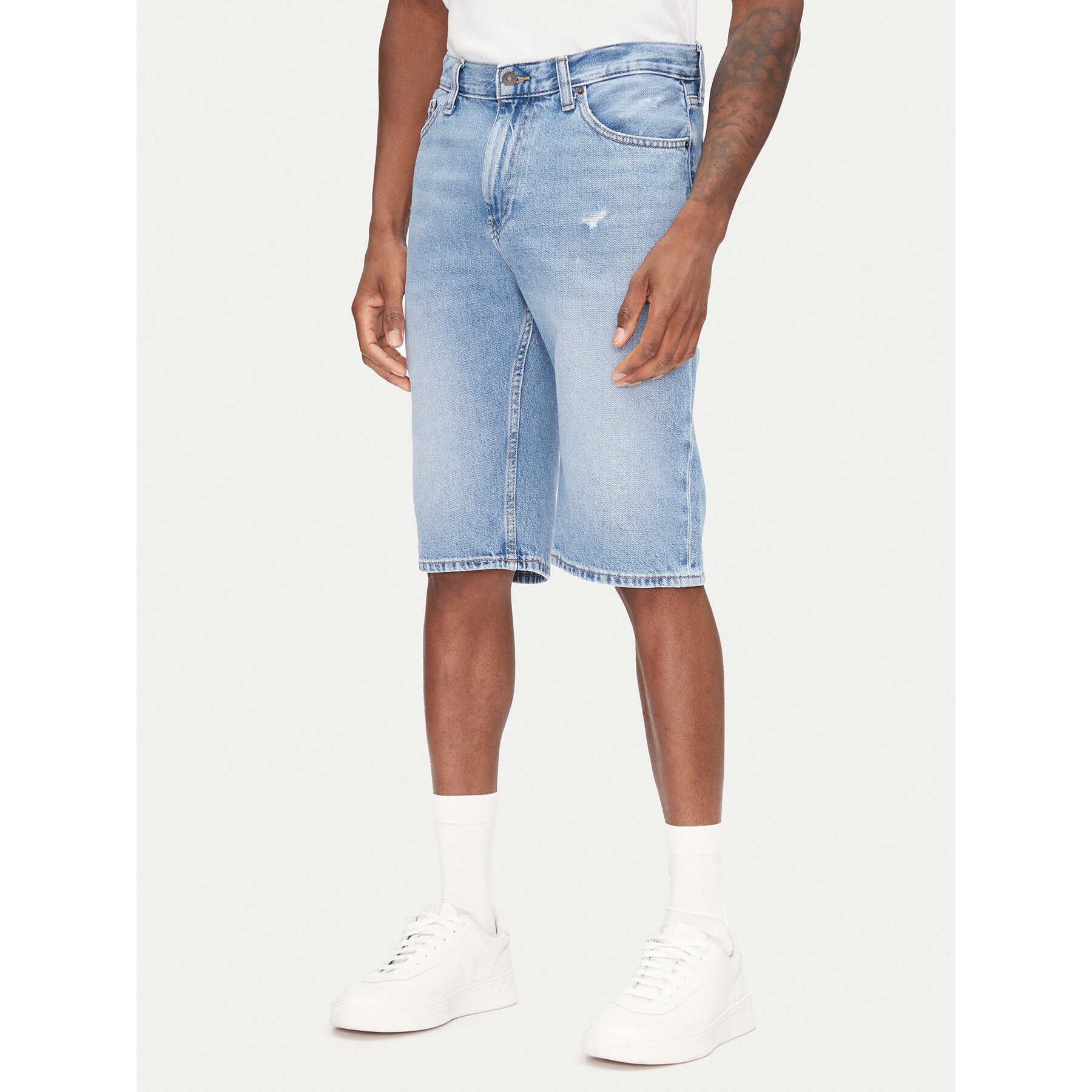 Tommy Jeans Szorty jeansowe Ryan DM0DM21855 Niebieski Slim Fit