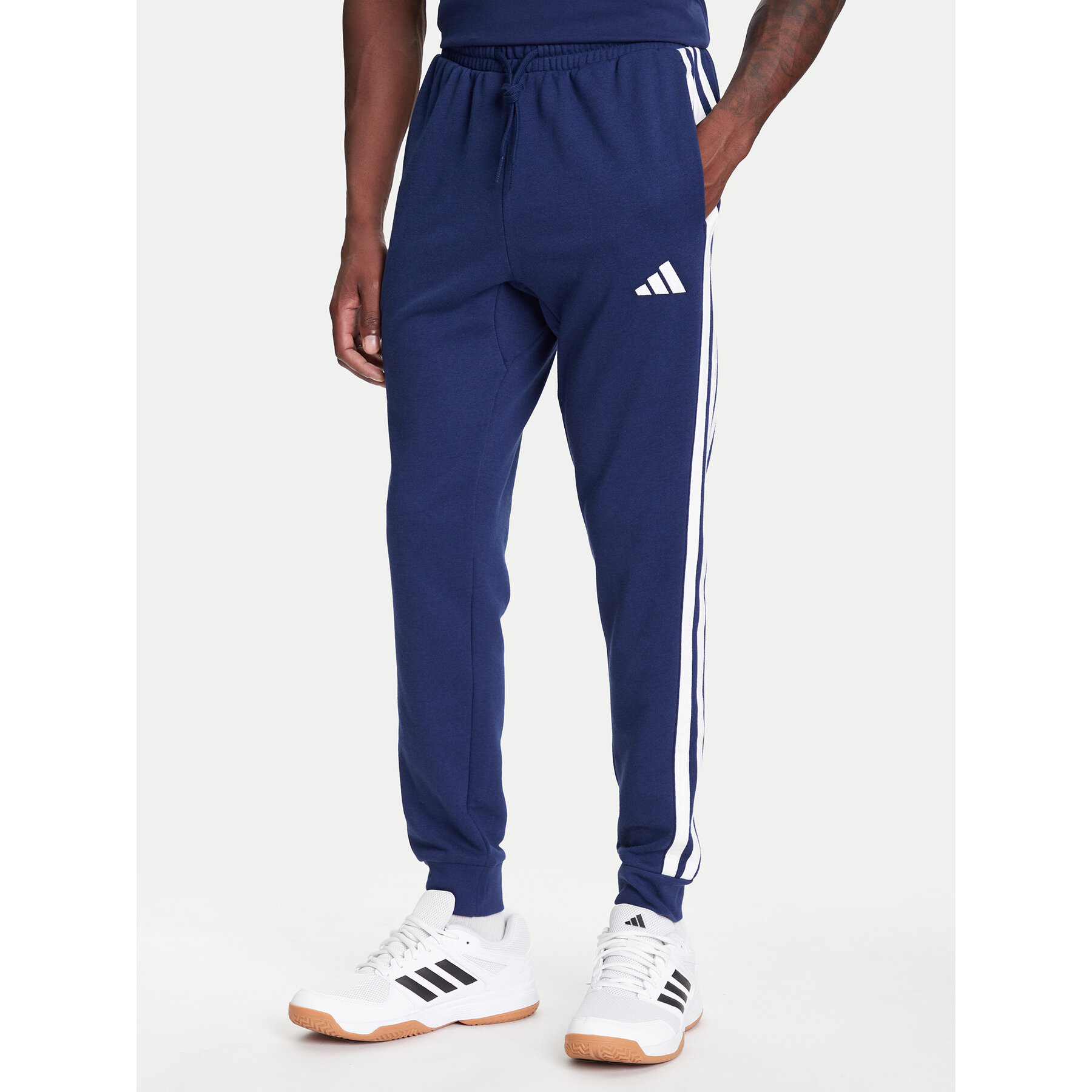 adidas Spodnie dresowe Essential 3-Stripes JD1878 Niebieski Regular Fit