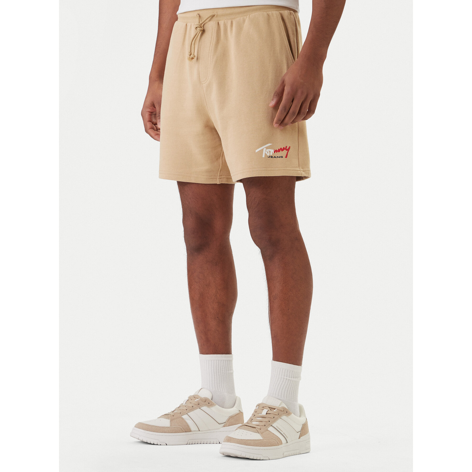 Tommy Jeans Szorty sportowe Signature DM0DM23017 Beżowy Regular Fit
