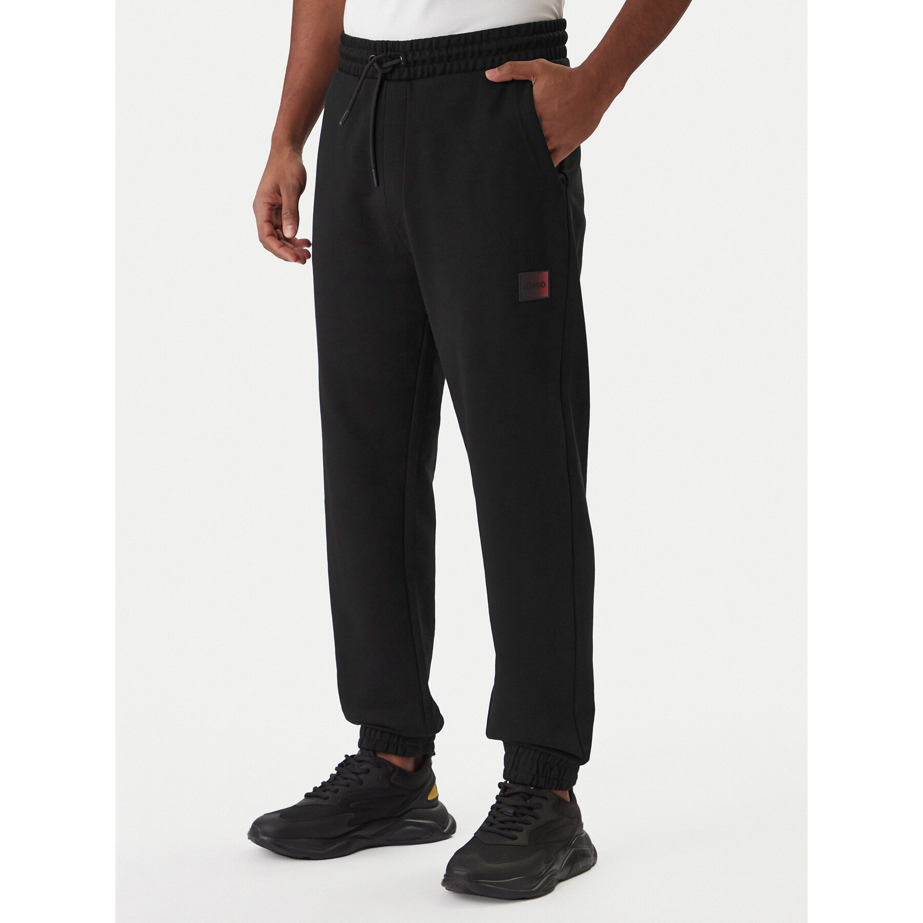 HUGO Spodnie dresowe Danopan 50553146 Czarny Relaxed Fit
