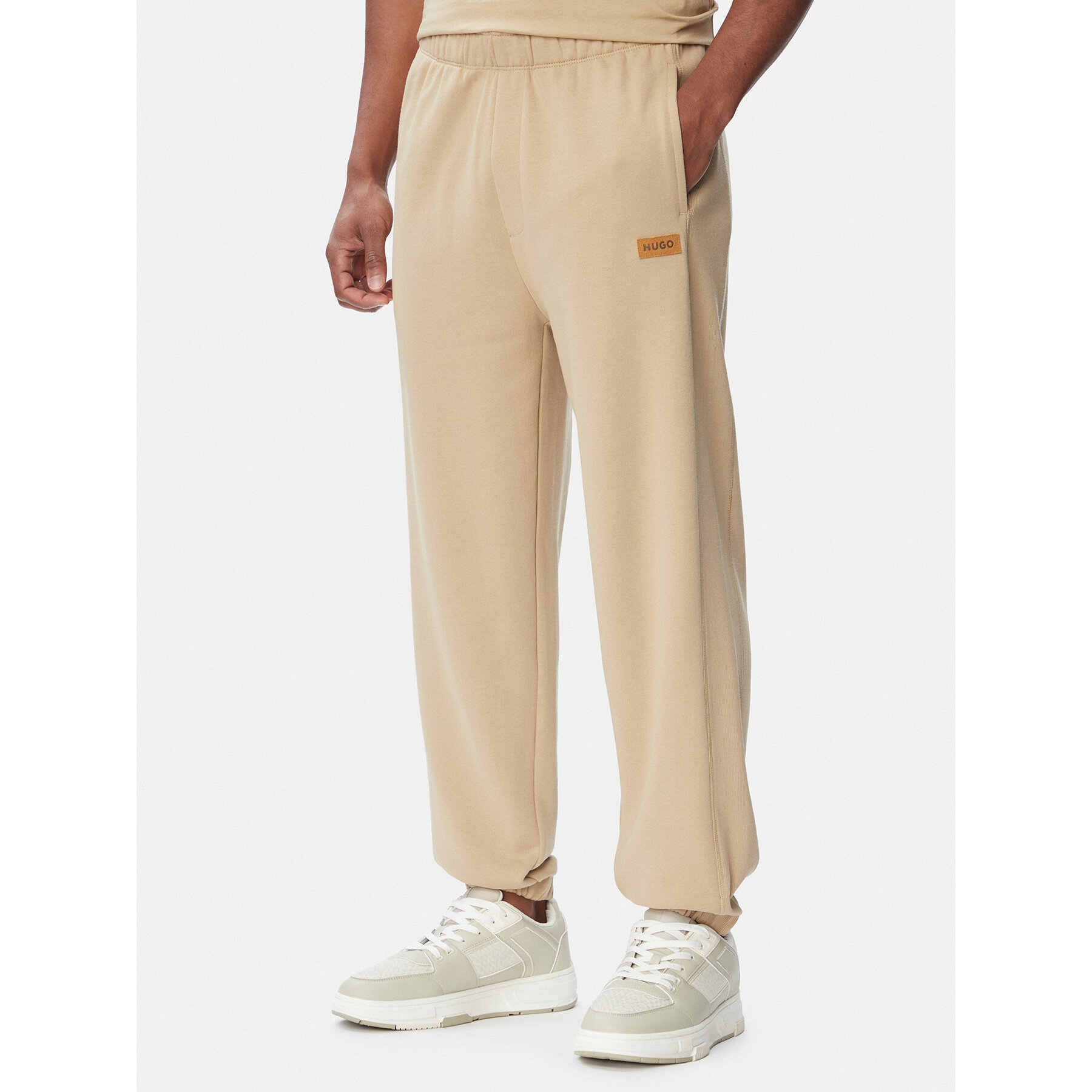 HUGO Spodnie dresowe Nevatro 50564047 Beżowy Regular Fit