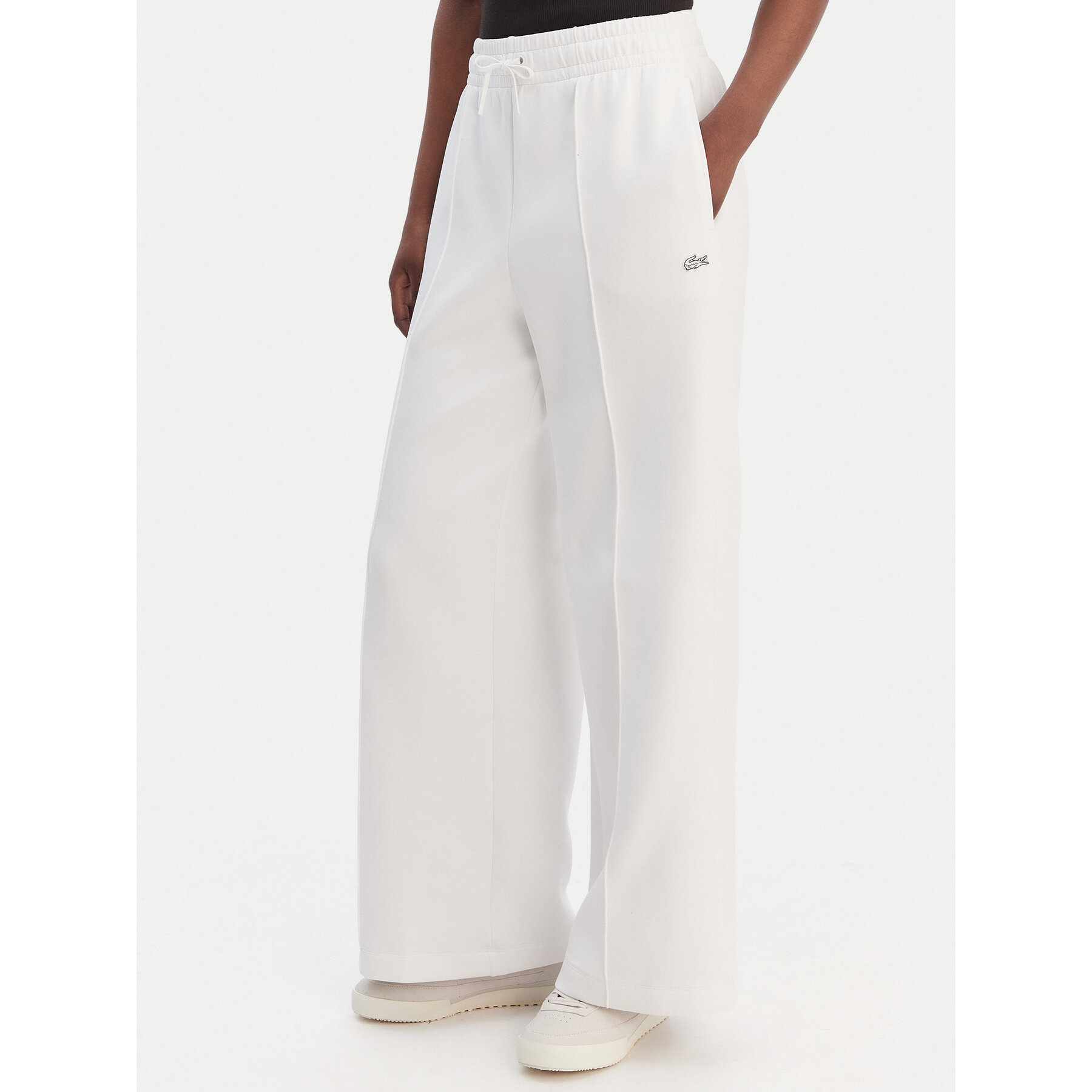 Lacoste Spodnie dresowe XF0041 Biały Relaxed Fit