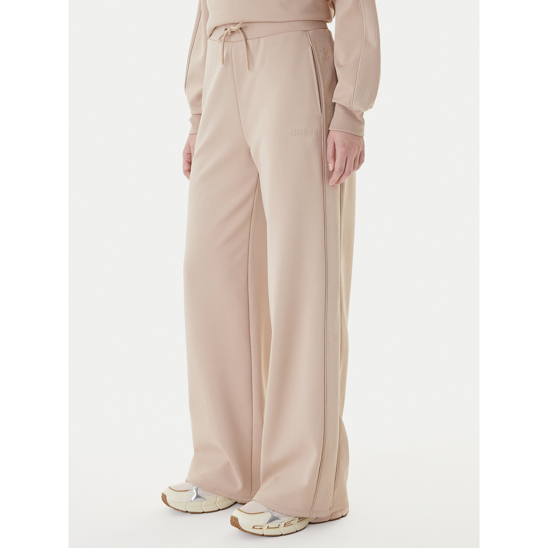 Guess Spodnie dresowe V5BB12 KCX22 Beżowy Regular Fit