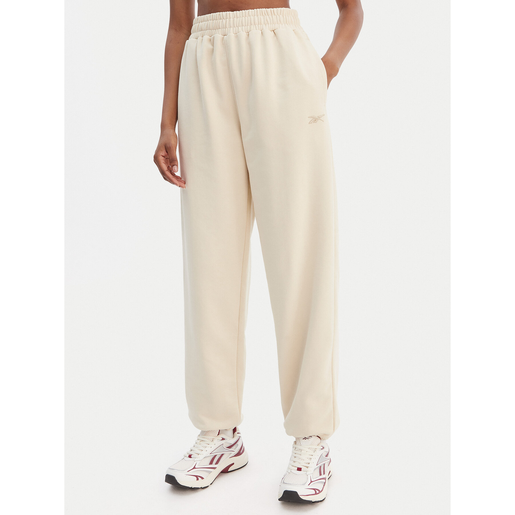 Reebok Spodnie dresowe Reebok x Ewa Chodakowska RK25621CCW Beżowy Relaxed Fit