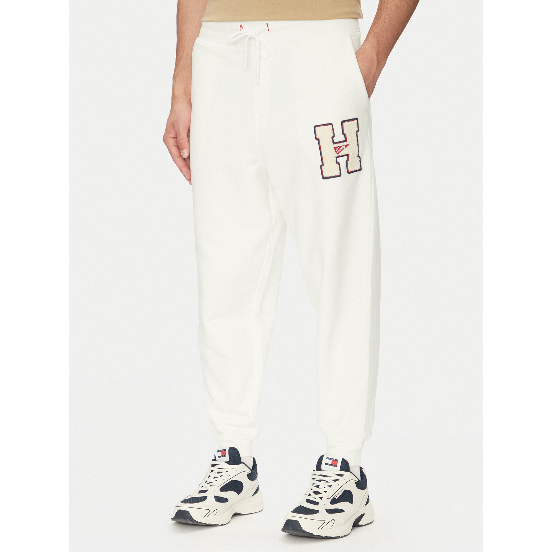 Tommy Jeans Spodnie dresowe Towel Patch DM0DM21277 Écru Regular Fit