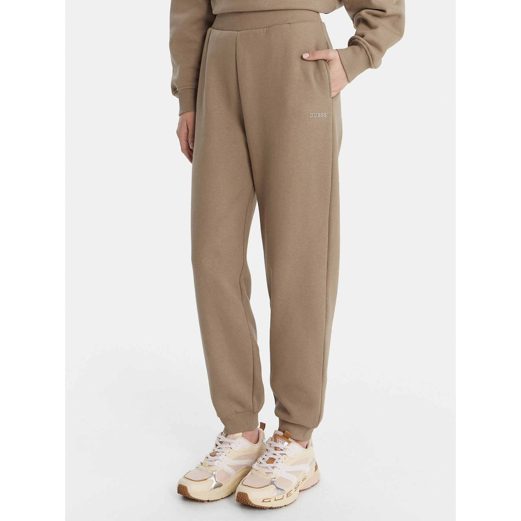 Guess Spodnie dresowe V6RB15 K9V31 Beżowy Regular Fit