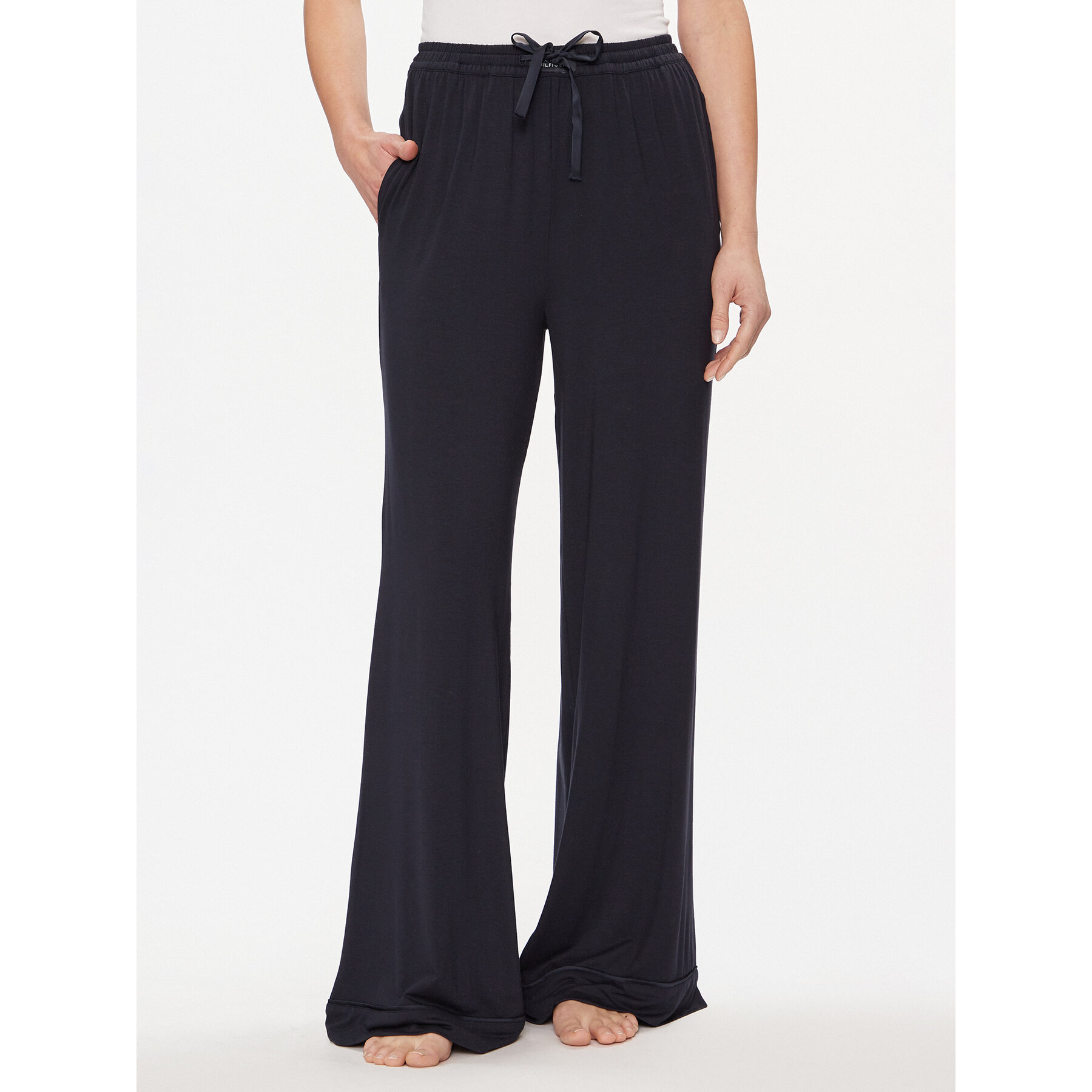 Tommy Hilfiger Spodnie dresowe UW0UW05195 Granatowy Relaxed Fit