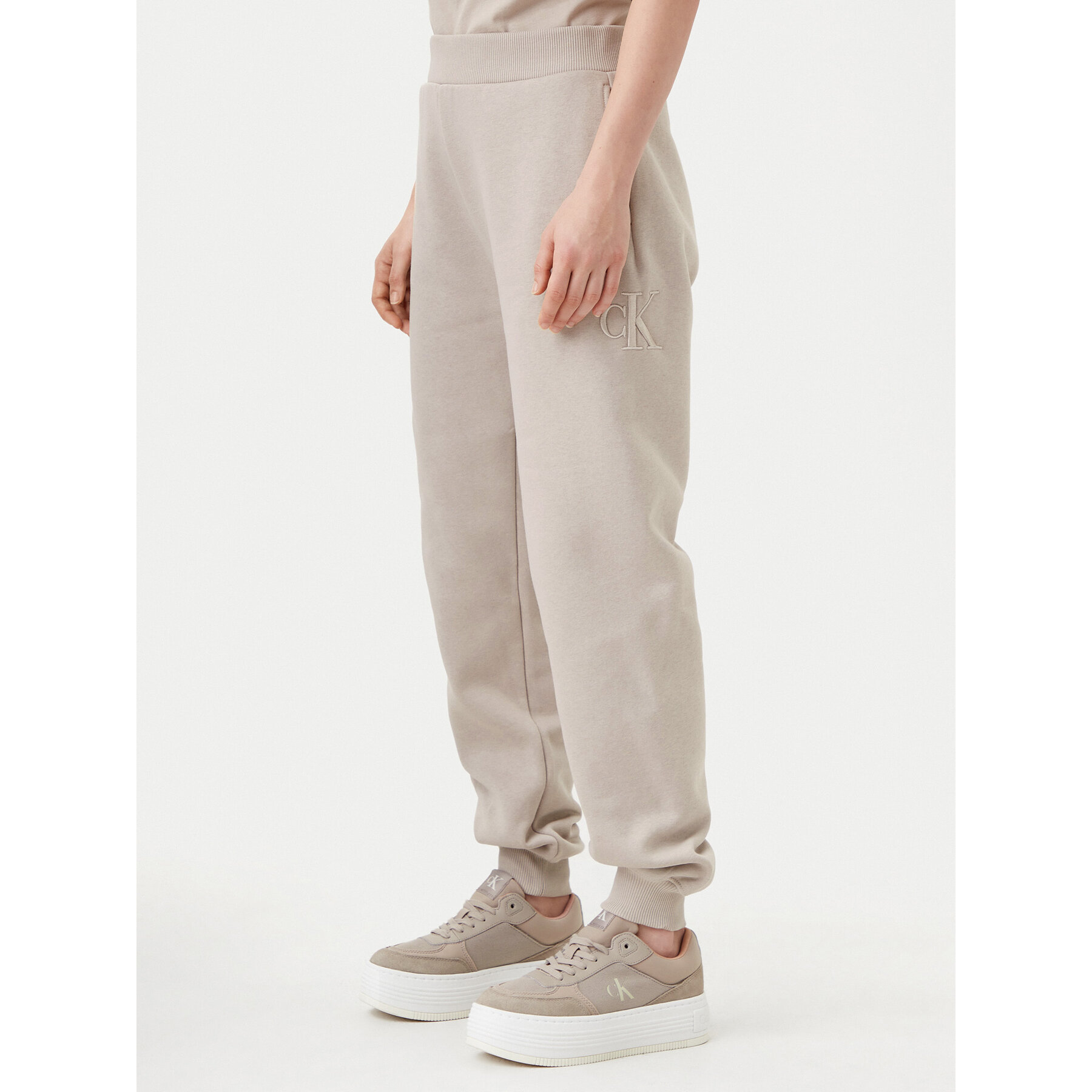 Calvin Klein Jeans Spodnie dresowe Raised J20J224841 Szary Relaxed Fit