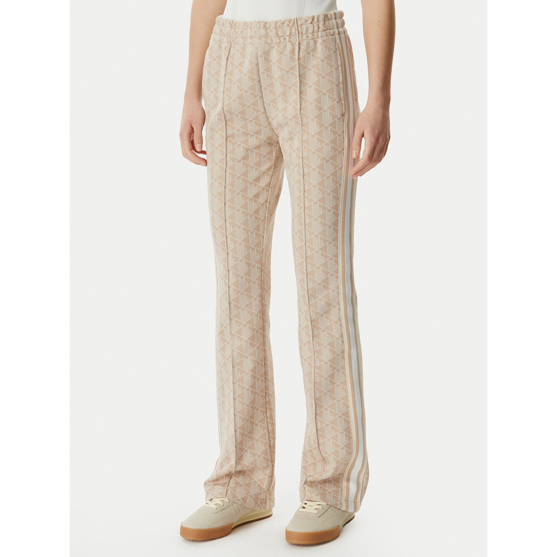 Lacoste Spodnie dresowe XF9313 Beżowy jasny Regular Fit