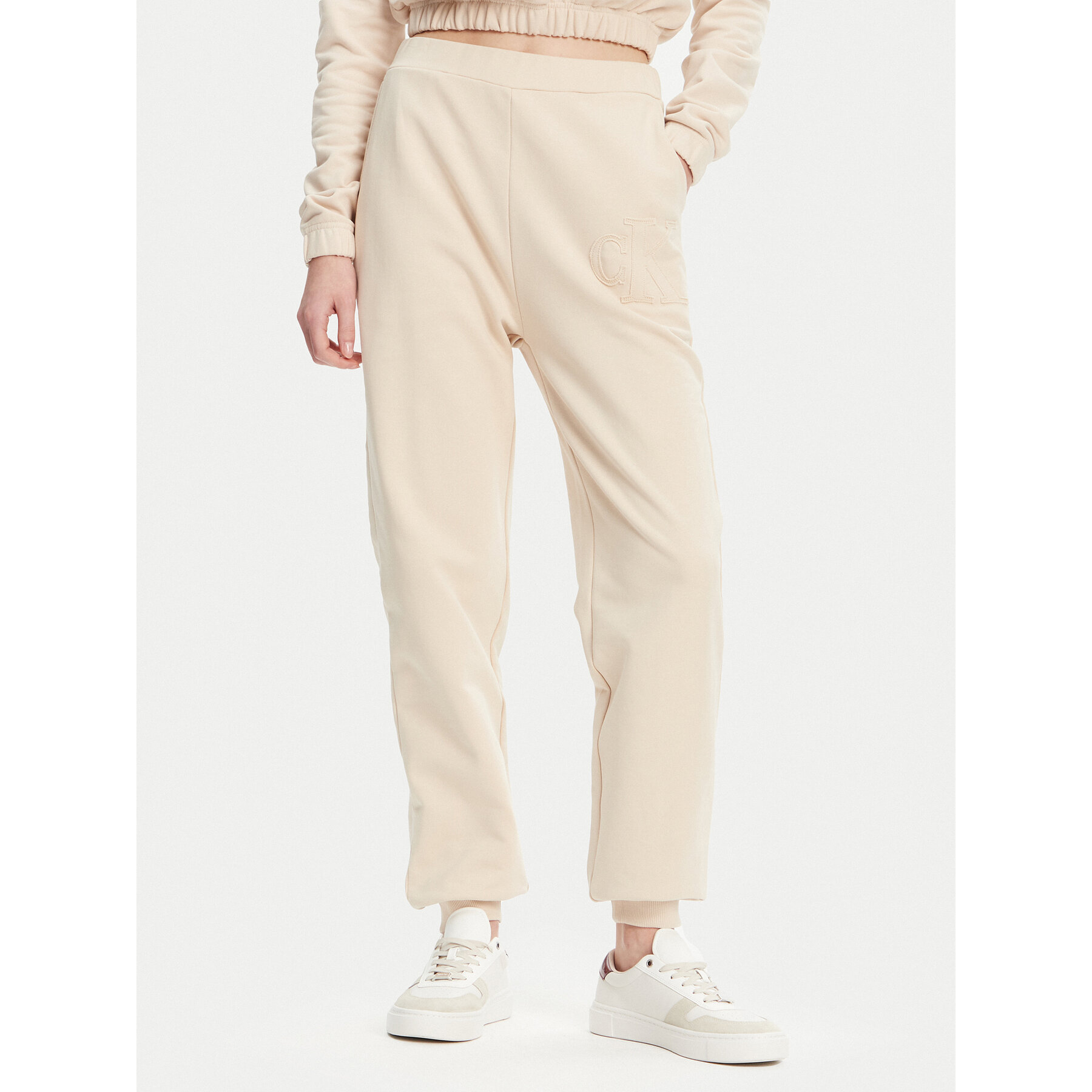 Calvin Klein Jeans Spodnie dresowe J20J225355 Beżowy Regular Fit