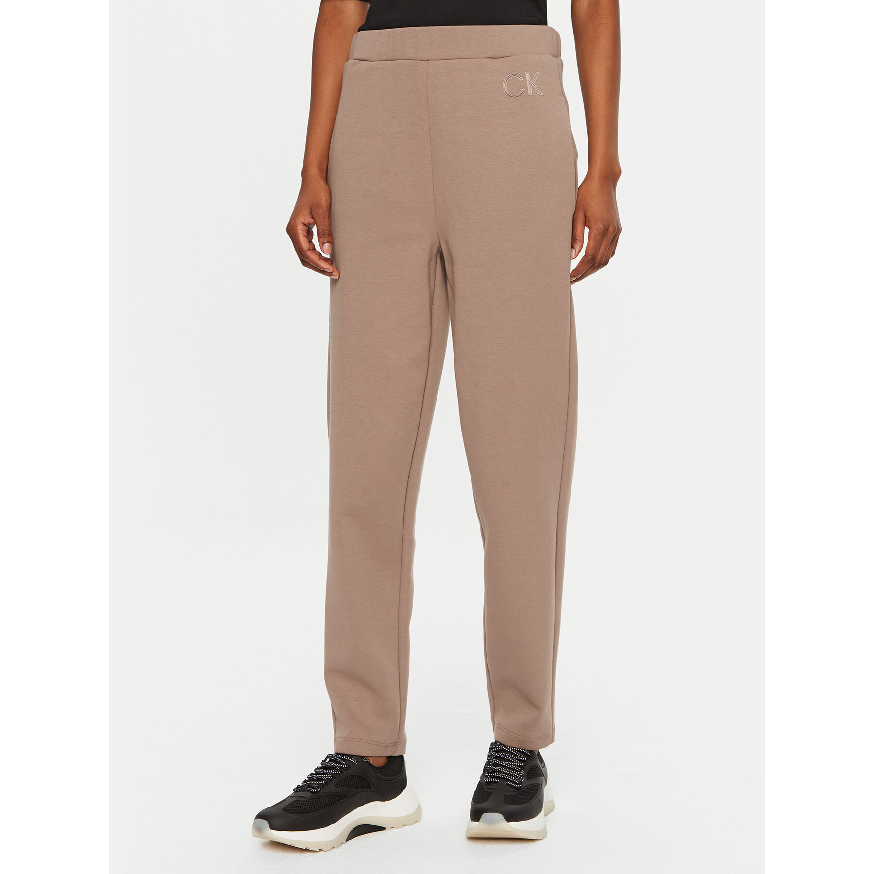Calvin Klein Spodnie dresowe Satin K20K207945 Beżowy Slim Fit