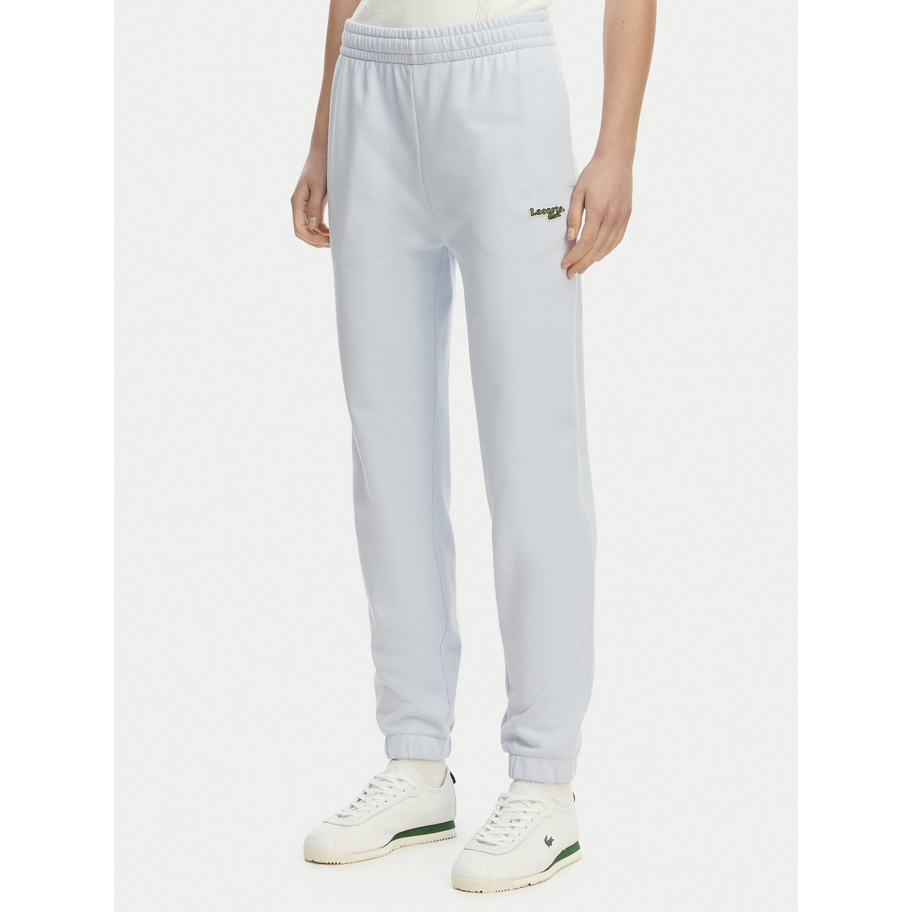 Lacoste Spodnie dresowe XF7604 Niebieski jasny Regular Fit
