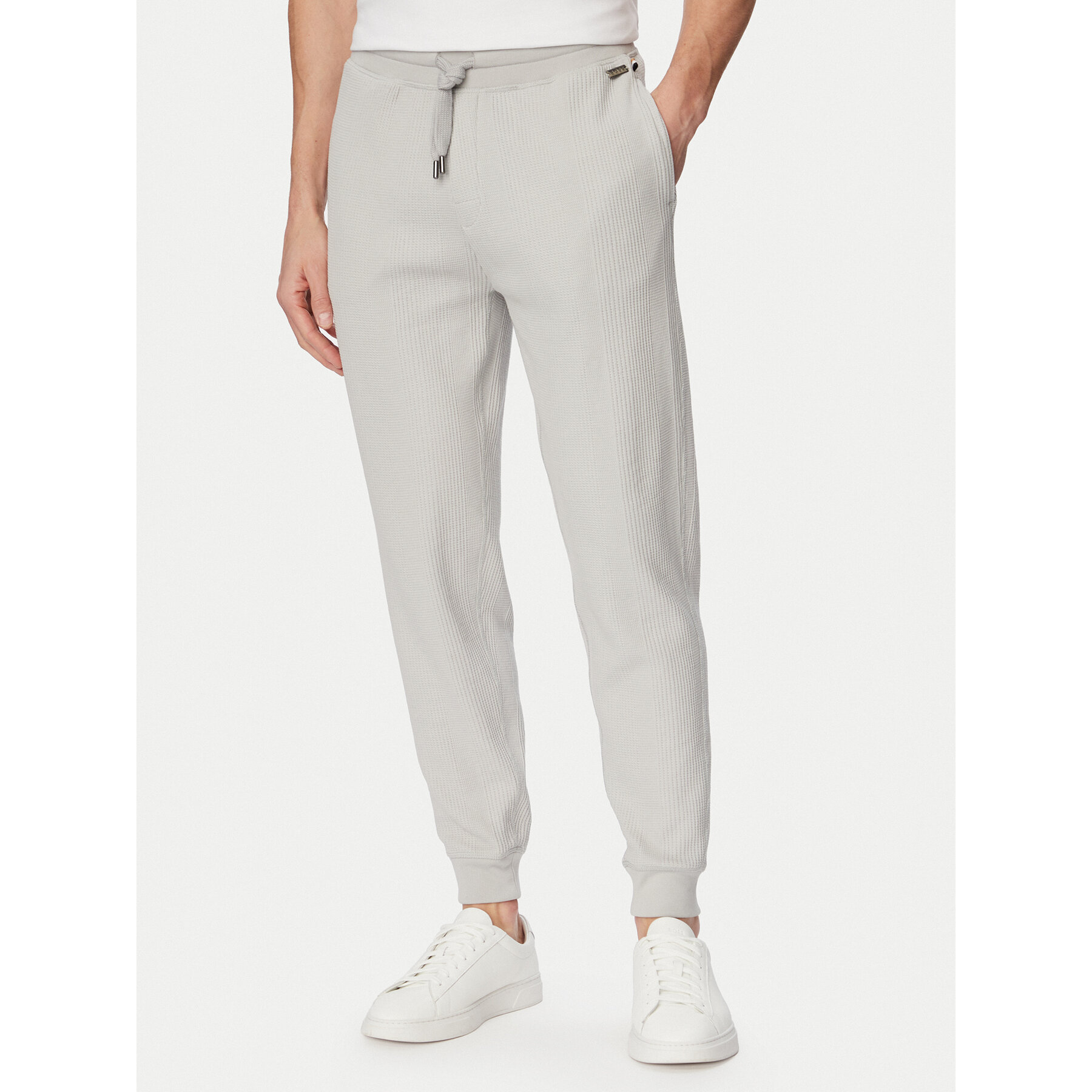 BOSS Spodnie dresowe Structure 50540577 Szary Regular Fit