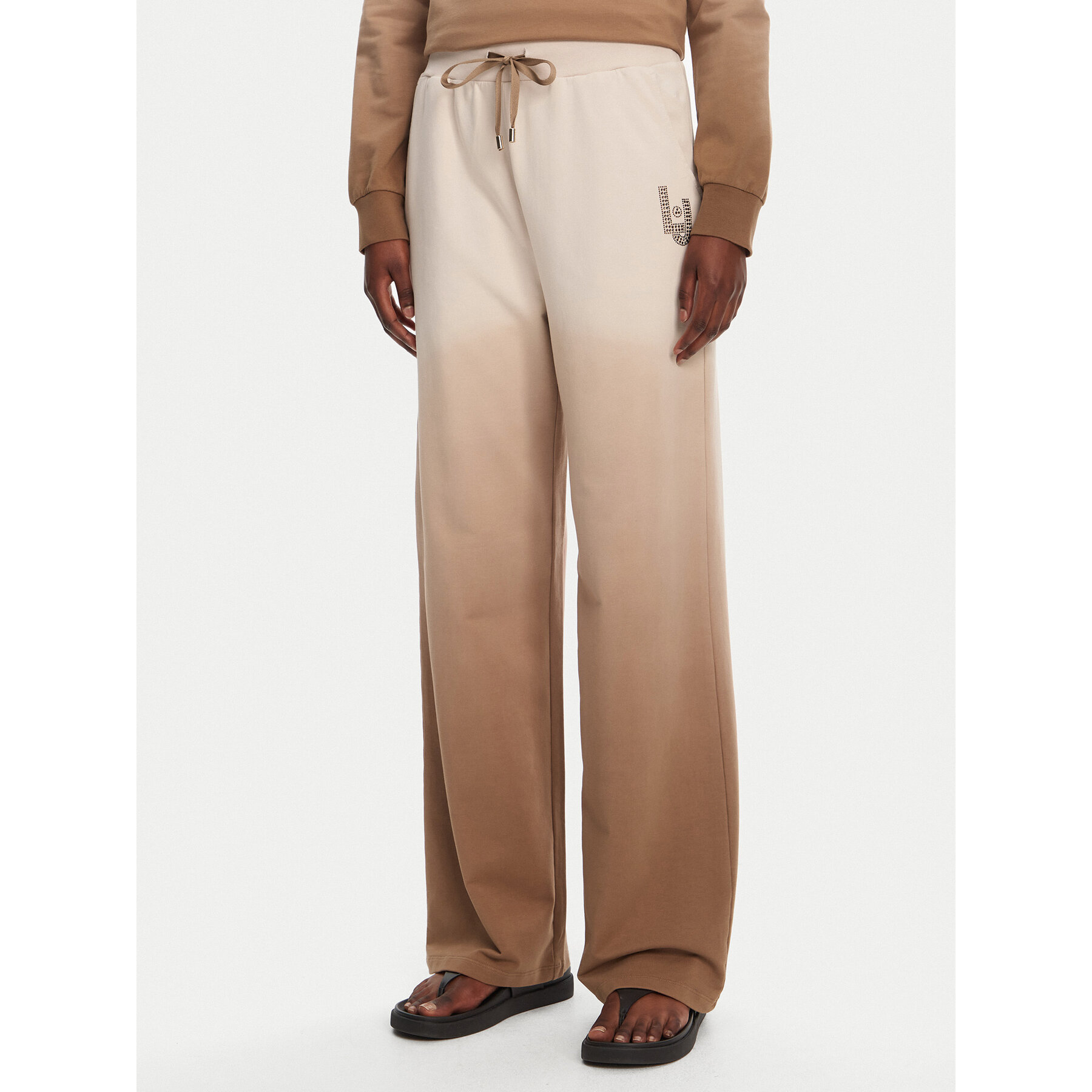 Liu Jo Sport Spodnie dresowe TA5116 FS090 Beżowy Relaxed Fit