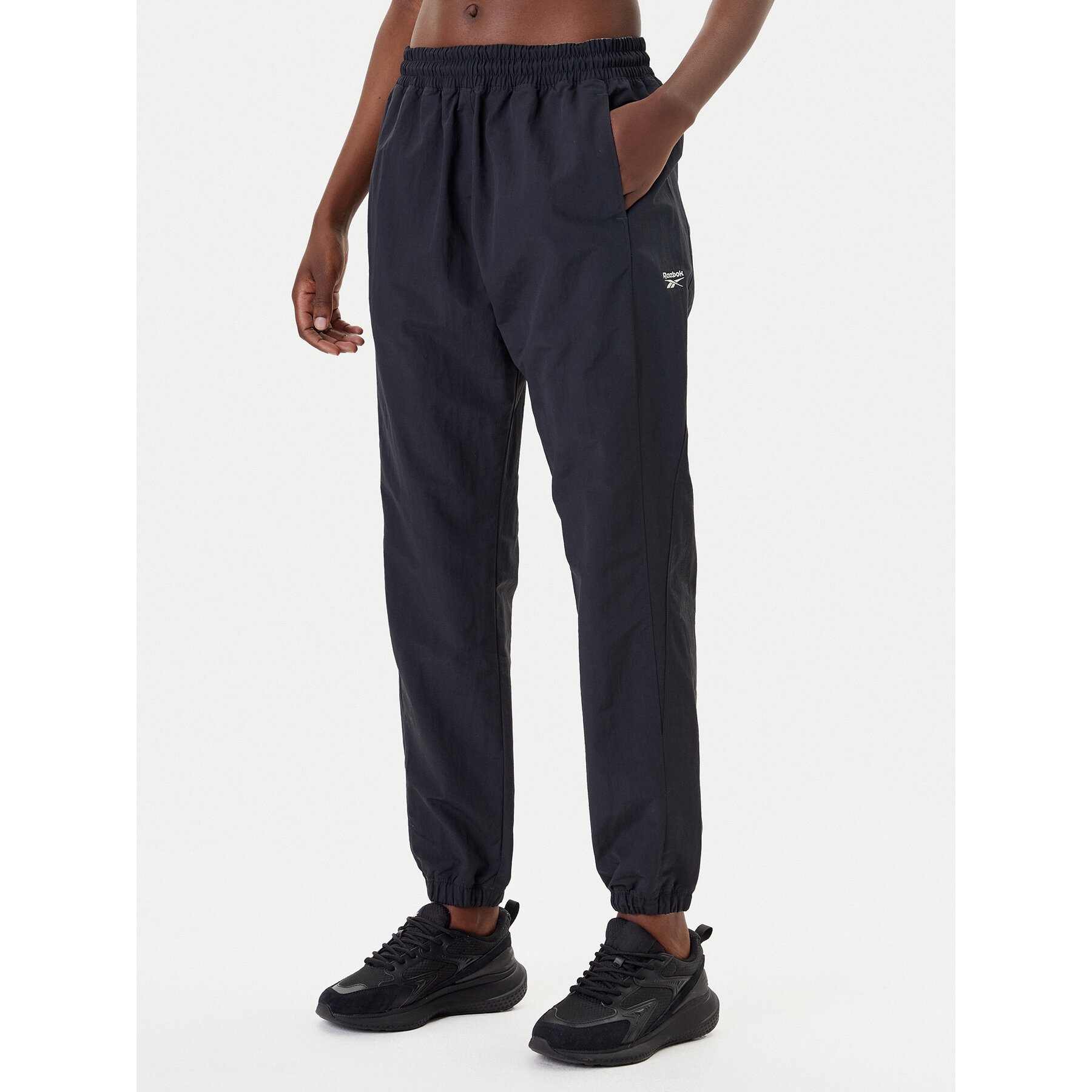 Reebok Spodnie dresowe Vector 100221435 Czarny Relaxed Fit