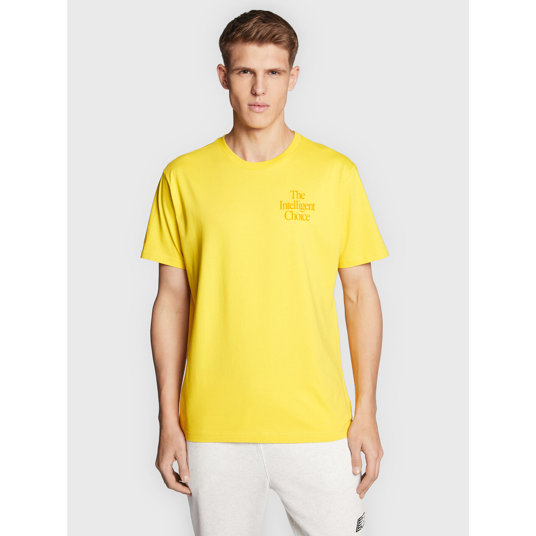 New Balance T-Shirt MT23502 Żółty Relaxed Fit